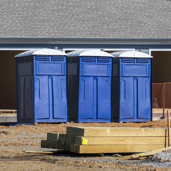 how often are the portable restrooms cleaned and serviced during a rental period in Pike